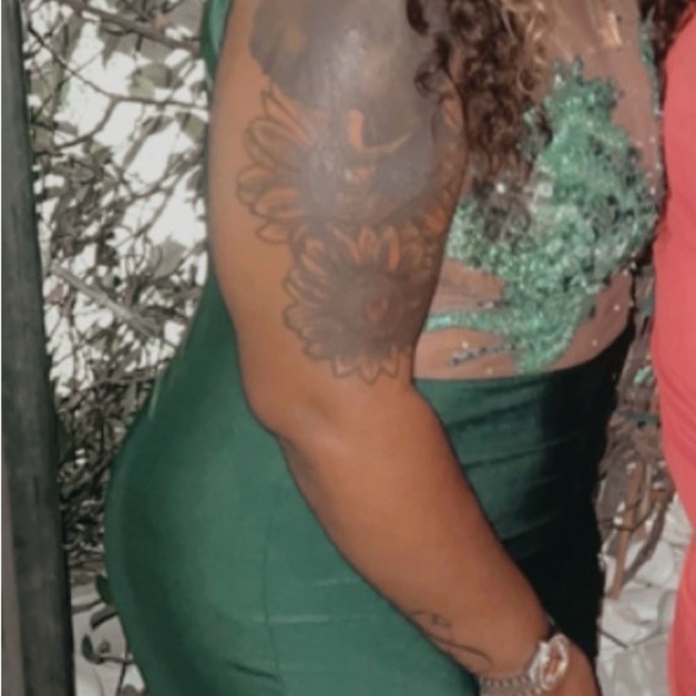 Green dress for sale.Very stretchy.Zipper back.worn once